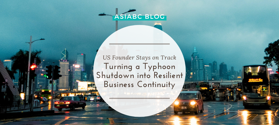 Rainy street in Hong Kong during typhoon season showing AsiaBC’s resilience for banking continuity on business disruption.